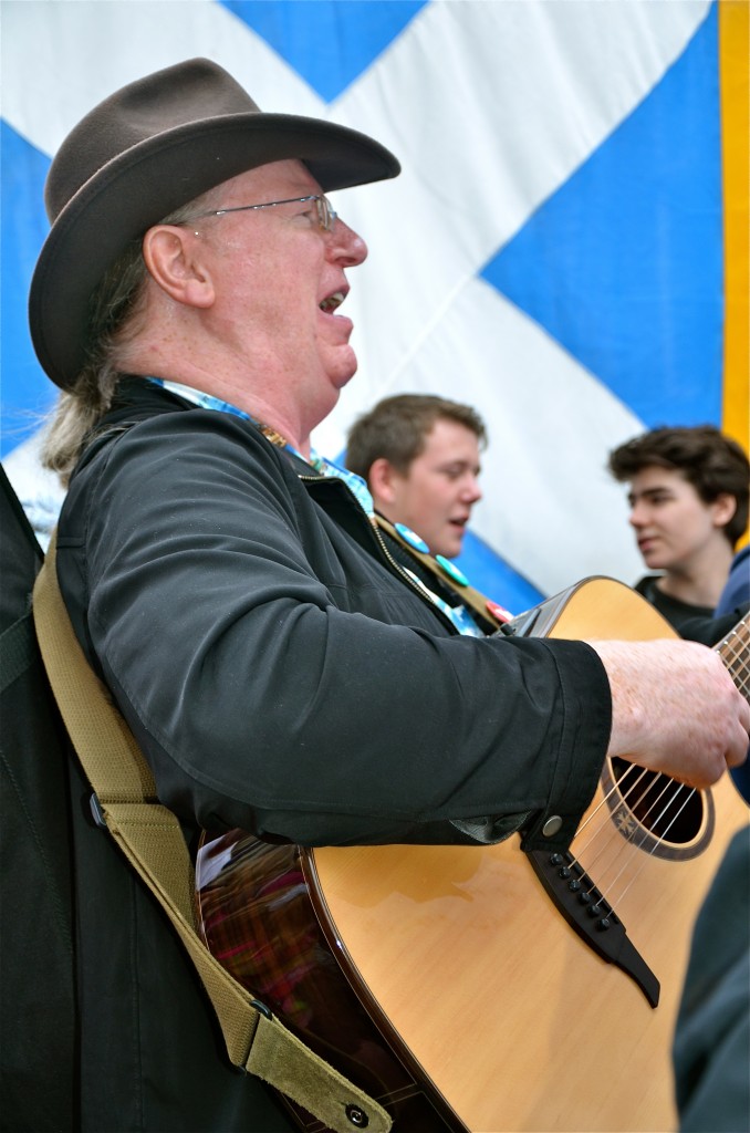 Man playing guitar at a Scottish independence rally, Edinburgh,